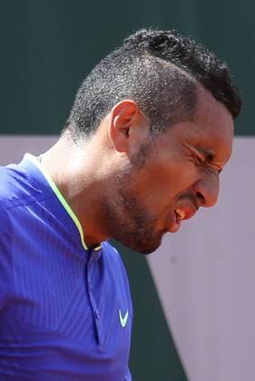Australian Nick Kyrgios reacts after a shot during his French Open men s first round match against Philipp Kohlschreiber of Germany at Roland Garros in Paris on May 30, 2017. Kyrgios defeated Kohlschreiber 6-3, 7-6 (4), 6-3 to advance to the second round.  PAR20170530003 DAVIDxSILPA