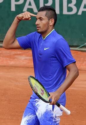 Australian Nick Kyrgios reacts after a shot during his French Open men s first round match against Philipp Kohlschreiber of Germany at Roland Garros in Paris on May 30, 2017. Kyrgios defeated Kohlschreiber 6-3, 7-6 (4), 6-3 to advance to the second round.  PAR20170530008 DAVIDxSILPA