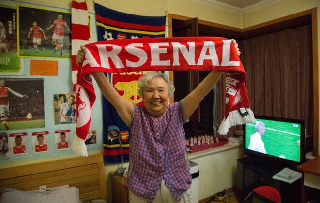 BEIJING, CHINA - MAY 28: 78-year-old gooner Liu Hongwen cheers for Arsenal after the FA Cup Final between Arsenal and Chelsea at home on May 28, 2017 in Beijing, China. 78-year-old retired teacher Liu Hongwen became an Arsenal fan in 2002. On Liu s 75 birthday, her son registered a Sina Weibo account for her. She supports Arsenal on Weibo and becomes a web celebrity with a nickname Gooner Granny Liu .  Copyright: xVCGx CFP111103650422 