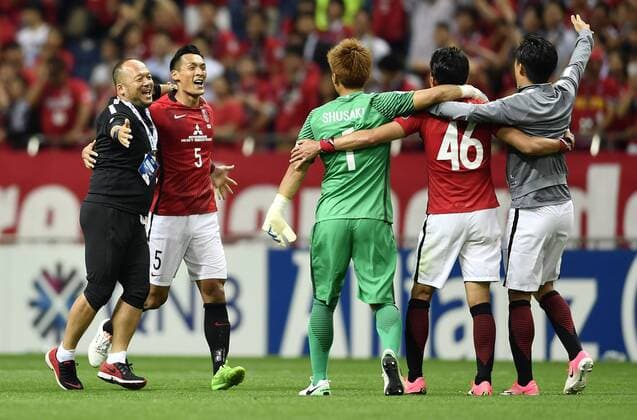 Tomoaki Makino of Japan s Urawa Red Diamonds, second left, celebrates with his teammates after defeating South Korea s Jeju United in their second Round of 16 match during the AFC Champions League 2017 in Urawa, Saitama, Japan, 31 May 2017. Urawa Red Diamonds defeated Jeju United 3-0 in their second Round of 16 match during the 2017 AFC Champions League in Saitama, Japan, 31 May 2017. Urawa Red Diamonds beats Jeju United in second Round of 16 match at AFC Champions League  20170531_31632