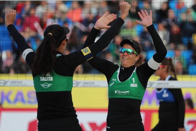 MOSCOW, RUSSIA â€“ JUNE 4, 2017: Larissa Franca (R) and Talita Antunes of Brazil celebrate scoring during the final match against US Brooke Sweat and Summer Ross at the Moscow leg of the 2017 FIVB Beach volleyball Beachvolleyball World Tour. Antunes and Franca won the gold medal match 2-0. Sergei Savostyanov TASS  TS051A49