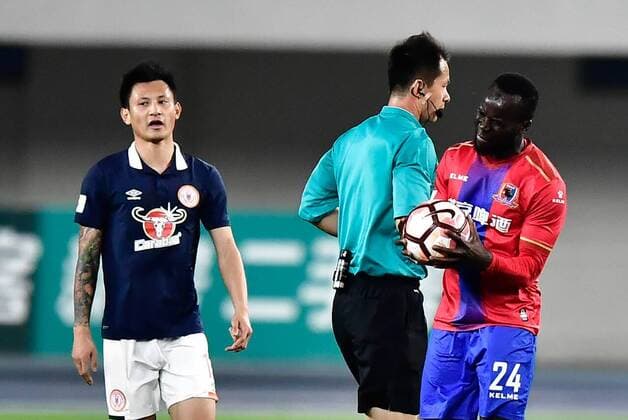 --FILE--Cheick Tiote of Beijing Enterprises Group F.C., right, competes against Beijing Renhe F.C. in their 6th round match during the 2017 Chinese Football Association China League, also known as China League One, in Beijing, China, 22 April 2017. Sad news out of China as a soccer player has collapsed during training and died. According to Sky Sports, former Newcastle midfielder Cheick Tiote collapsed on Monday (5 June 2017) at practice and passed away. He was just 30 years old. The Ivory Coast international moved to China just a few months ago and had been playing from Beijing Enterprises. He was taken to the hospital but passed after emergency treatment. Former Newcastle defender Cheick Tiote collapsed and died in China during training  20170422_09698