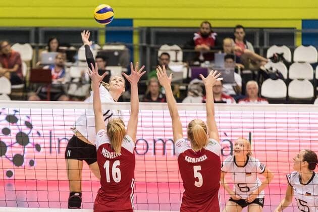 Volleyball: Montreux Volley Masters 2017, 09.06.2017 Louisa Lippmann ( 11, Germany) smashes against Natalia Medrzyk ( 16, Poland) and Agnieszka Kakolewska ( 5, Poland); match Germany versus Poland at the Volleyball: Montreux Volley Masters 2017 on June, 09, 2017 in Montreux, Schweiz xUSx