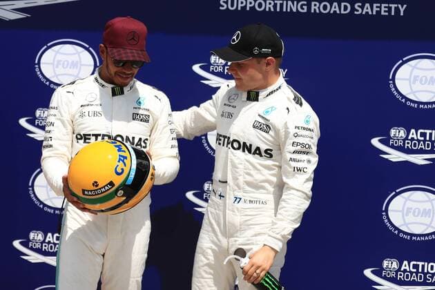 June 10th 2017, Circuit Gilles Villeneuve, Montreal Quebec, Canada; Formula One Grand Prix, Qualifying sessions; Lewis Hamilton - Mercedes AMG Petronas F1 W08 takes pole and and is presented with a hisoric Senna helmet by his family with Valtteri Bottas xOctanex  ActionPlus11889101