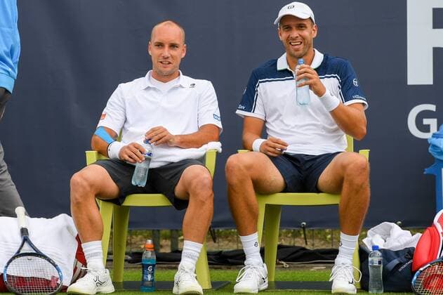 Luxembourgish Gilles Muller and Belgian Steve Darcis pictured during a first round game between Belgian Steve Darcis and Luxembourg s Gilles Muller against US Scott Lipsky and Indian Leander Paes in the men s doubles during the Ricoh Open ATP Tennis Herren tennis tournament in Rosmalen, the Netherlands, Monday 12 June 2017. LUCxCLAESSEN  x05111879x