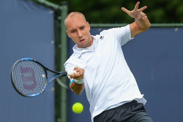 Belgian Steve Darcis pictured in action during a first round game between Belgian Steve Darcis and Luxembourg s Gilles Muller against US Scott Lipsky and Indian Leander Paes in the men s doubles during the Ricoh Open ATP Tennis Herren tennis tournament in Rosmalen, the Netherlands, Monday 12 June 2017. LUCxCLAESSEN  x05111883x