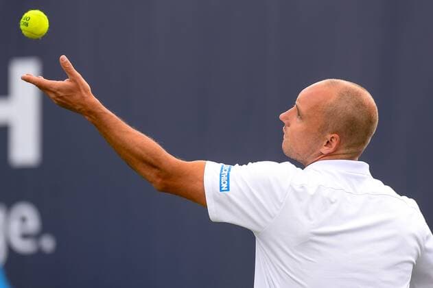 Belgian Steve Darcis pictured in action during a first round game between Belgian Steve Darcis and Luxembourg s Gilles Muller against US Scott Lipsky and Indian Leander Paes in the men s doubles during the Ricoh Open ATP Tennis Herren tennis tournament in Rosmalen, the Netherlands, Monday 12 June 2017. LUCxCLAESSEN  x05111888x