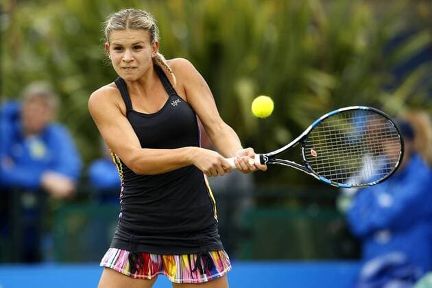 Jana Fett of Croatia in action against Mona Barthel during the AEGON Championship 1st Round match at the Nottingham Tennis Centre. Picture date: June 12th, 2017. Picture credit should read: Matt McNulty Sportimage EDITORIAL USE ONLY. No use with unauthorised audio, video, data, fixture lists, club league logos or live services. Online in-match use limited to 120 images, no video emulation. No use in betting, games or single club league player publications.