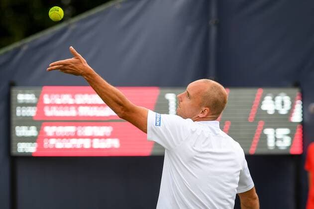 Belgian Steve Darcis pictured in action during a first round game between Belgian Steve Darcis and Luxembourg s Gilles Muller against US Scott Lipsky and Indian Leander Paes in the men s doubles during the Ricoh Open ATP Tennis Herren tennis tournament in Rosmalen, the Netherlands, Monday 12 June 2017. LUCxCLAESSEN  x05111886x