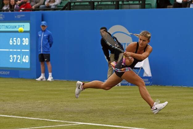 June 12th 2017, Nottingham, England; WTA Tennis Damen Aegon Nottingham Open Tennis Tournament day 3; Qualifier Jana Fett of Croatia stretches to hit a forehand back to 7th seed Mona Barthel of Germany; Fett who she beat 6-3 5-7 7-5 Fett saved 3 match points before winning xLeexParkerx  ActionPlus11889877
