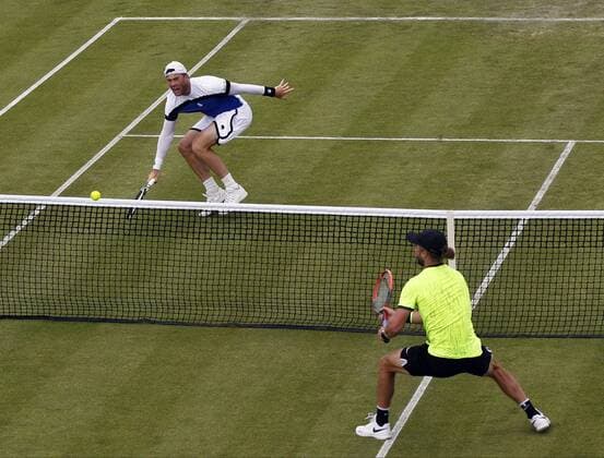 June 12th 2017, Nottingham, England; WTA Tennis Damen Aegon Nottingham Open Tennis Tournament day 3; 8th seed Illya Marchenko of the Ukraine beats qualifier Liam Broady of the UK with a passing shot at the net xLeexParkerx  ActionPlus11889905