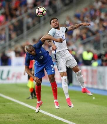 France s Djibril Sidibe tussles with England s Kyle Walker during the Friendly match at Stade De France Stadium, Paris Picture date 13th June 2017. Picture credit should read: David Klein Sportimage EDITORIAL USE ONLY. No use with unauthorised audio, video, data, fixture lists, club league logos or live services. Online in-match use limited to 120 images, no video emulation. No use in betting, games or single club league player publications.