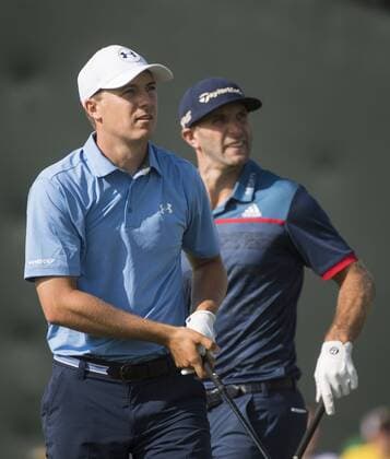 Dustin Johnson and Jordan Spieth watch Spite s drive off of the 10th tee during round 1 of the 117th U.S. Open golf tournament at Erin Hill golf course in Erin, Wisconsin on June 15, 2017.  WIS20170615306 KEVINxDIETSCH