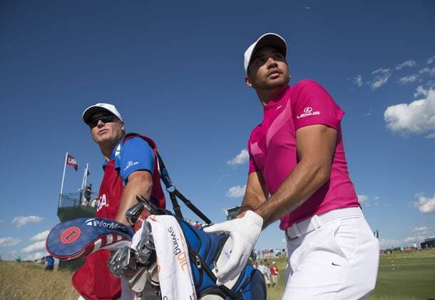 Jason Day and his caddie Col Swatton walk off the 10th green during round 1 of the 117th U.S. Open golf tournament at Erin Hill golf course in Erin, Wisconsin on June 15, 2017.  WIS20170615351 KEVINxDIETSCH