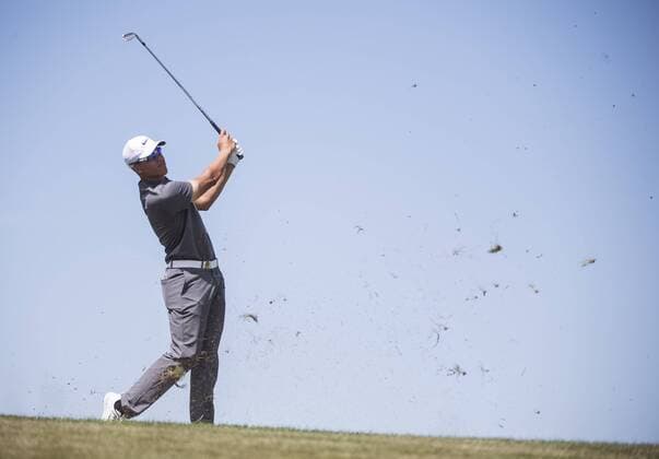 Cameron Champ hits on the 8th fairway during round 2 of the 117th U.S. Open golf tournament at Erin Hill golf course in Erin, Wisconsin on June 16, 2017.  WIS20170616335 KEVINxDIETSCH