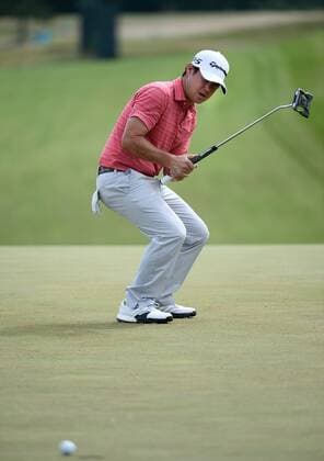 Brian Harman reacts after missing a birdie putt on the 8th hole during round 3 of the 117th U.S. Open golf tournament at Erin Hill golf course on June 17, 2017 in Erin, Wisconsin.  WIS20170617108 BRIANxKERSEY