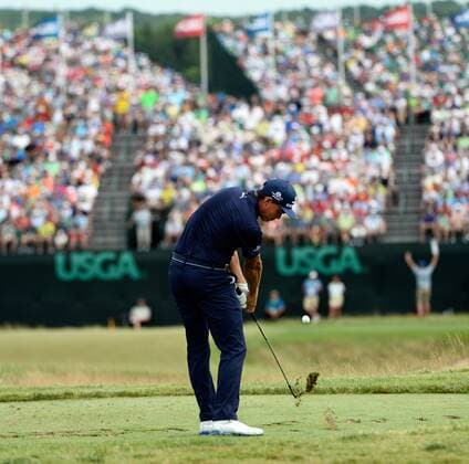 Rickie Fowler tees off on the 9th hole during round 3 of the 117th U.S. Open golf tournament at Erin Hill golf course on June 17, 2017 in Erin, Wisconsin.  BK18531 BRIANxKERSEY