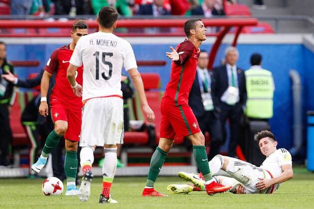 Portugal vs. Mexico KAZAN, RT - 18.06.2017: PORTUGAL VS. MEXICO - CRISTIANO RONALDO of Portugal complains with the referee during a match between Portugal and Mexico valid for the first round of the Confederations Cup 2017 on Sunday (18), held at the Kazan Arena in Kazan, Russia. (Photo: Marcelo Machado de Melo Fotoarena) x1339402x  MarceloxMachadoxdexMelo