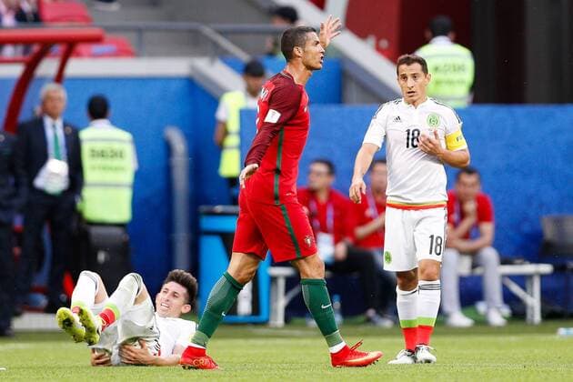 Portugal vs. Mexico KAZAN, RT - 18.06.2017: PORTUGAL VS. MEXICO - CRISTIANO RONALDO of Portugal complains with the referee during a match between Portugal and Mexico valid for the first round of the Confederations Cup 2017 on Sunday (18), held at the Kazan Arena in Kazan, Russia. (Photo: Marcelo Machado de Melo Fotoarena) x1339404x  MarceloxMachadoxdexMelo