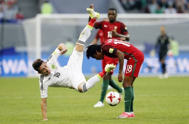 Portugal vs. Mexico KAZAN, RT - 18.06.2017: PORTUGAL VS. MEXICO - HERRERA Hector of Mexico plays for Portugal& 3GELSON MAR MARTINS during a match between Portugal and Mexico valid for the first round of the Confederations Cup 2017 on Sunday (18) held at the Kazan Arena in Kazan, Russia. (Photo: Rodolfo Buhrer La Imagem Fotoarena) x1339426x  RodolfoxBuhrer