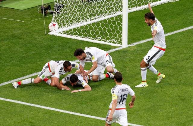 Soccer Football - Portugal v Mexico - FIFA Confederations Cup Russia 2017 - Group A - Kazan Arena, Kazan, Russia - June 18, 2017 MexicoÕs Hector Moreno celebrates scoring their second goal with team mates FOOTBALL : Portugal vs Mexique - Coupe Des Confederations - Kazan - 18 06 2017 ActionImages Panoramic  VPC_12