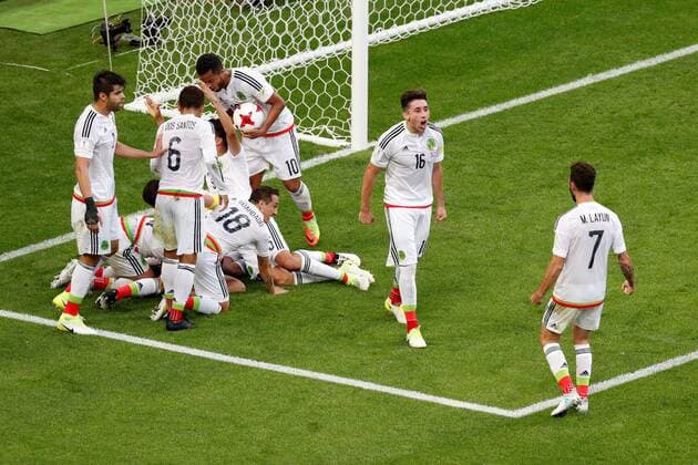 Soccer Football - Portugal v Mexico - FIFA Confederations Cup Russia 2017 - Group A - Kazan Arena, Kazan, Russia - June 18, 2017 MexicoÕs Hector Moreno celebrates scoring their second goal with team mates FOOTBALL : Portugal vs Mexique - Coupe Des Confederations - Kazan - 18 06 2017 ActionImages Panoramic  VPC_12