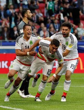 Soccer Football - Portugal v Mexico - FIFA Confederations Cup Russia 2017 - Group A - Kazan Arena, Kazan, Russia - June 18, 2017 MexicoÕs Hector Moreno celebrates scoring their second goal with Javier Hernandez and Oribe Peralta FOOTBALL : Portugal vs Mexique - Coupe Des Confederations - Kazan - 18 06 2017 ActionImages Panoramic  VPC_12