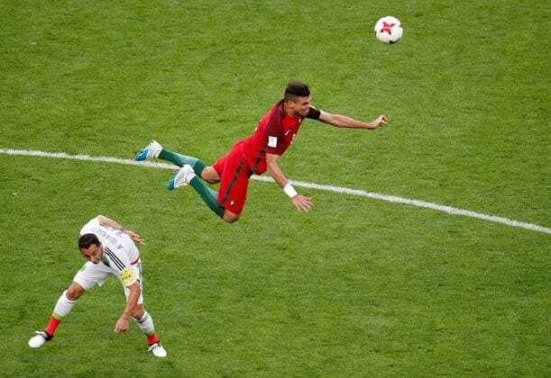 Soccer Football - Portugal v Mexico - FIFA Confederations Cup Russia 2017 - Group A - Kazan Arena, Kazan, Russia - June 18, 2017 PortugalÕs Pepe in action with MexicoÕs Andres Guardado FOOTBALL : Portugal vs Mexique - Coupe Des Confederations - Kazan - 18 06 2017 ActionImages Panoramic  VPC_12