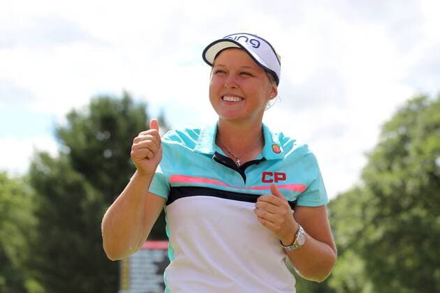 June 18, 2017 - Belmont, Michigan, United States - Brooke M. Henderson of Canada reacts after being showered with champagne by her father upon returning to the 18th green after winning the Meijer LPGA Golf Damen Classic golf tournament at Blythefield Country Club in Belmont, MI, USA Sunday, June 18, 2017. Meijer LPGA Classic - Final Round  - ZUMAn230 20170618_zaa_n230_501 Copyright: xAmyxLemusx