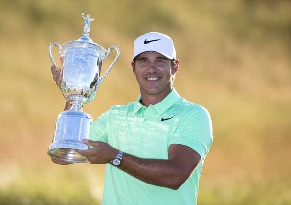 Brooks Koepka poses with the trophy after winning the 117th U.S. Open golf tournament at Erin Hills golf course on June 18, 2017, in Erin, Wisconsin. Koepka posted a final score of 16-under-par.  WIS20170618307 KEVINxDIETSCH