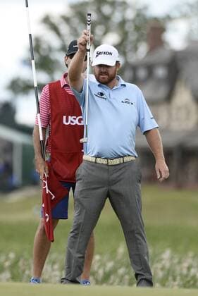 J.B. Holmes lines up a putt on No. 1 during the final round of the 117th U.S. Open golf tournament at Erin Hills golf course on June 18, 2017, in Erin, Wisconsin.  WIS20170618519 BRIANxKERSEY