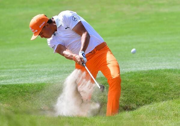 Rickie Fowler blasts from a fairway bunker at No. 5 during the final round of the 117th U.S. Open golf tournament at Erin Hills golf course on June 18, 2017, in Erin, Wisconsin.  WIS20170618539 KEVINxDIETSCH