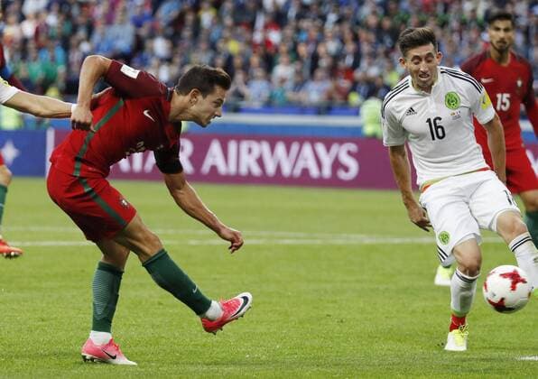 Soccer: Portugal, Mexico draw 2-2 in Confed Cup Cedric Soares (L) of Portugal scores his team s second goal during the second half of a Confederations Cup match against Mexico in Kazan, Russia, on June 18, 2017. The game ended in a 2-2 draw. 