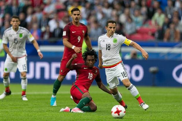 (170619) -- KAZAN, June 19, 2017 -- Portugal s Gelson Martins (R2) vies with Mexico s Andres Guardado during the 2017 Confederations Cup Group A football match in Kazan, Russia, on June 18, 2017. ) (SP)RUSSIA-KAZAN-2017 FIFA CONFEDERATIONS CUP BaixXueqi 