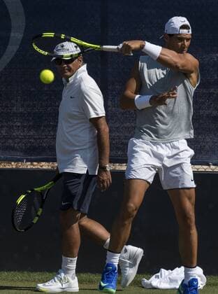 Spanish tennis player Rafa Nadal (R) in action next to his coach Toni Nadal during a training session at the Mallorca Open tennis center in Palma Majorca, the Balearic Islands, Spain, on 19 June 2017. The 15 grand slam winner Rafa Nadal Nadal is preparing for the 2017 Wimbledon Championships that will be held at the All England Lawn Tennis and Croquet Club in Wimbledon from 03 July to 16 July. Rafa Nadal gets ready for Wimbledon !ACHTUNG: NUR REDAKTIONELLE NUTZUNG!  Copyright: xCATIxCLADERAx GRA251 20170619-636334807798741709