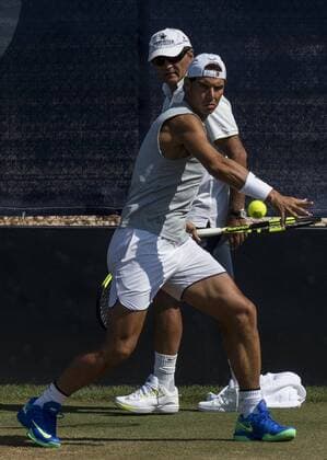 Spanish tennis player Rafa Nadal (front) in action next to his coach Toni Nadal during a training session at the Mallorca Open tennis center in Palma Majorca, the Balearic Islands, Spain, on 19 June 2017. The 15 grand slam winner Rafa Nadal Nadal is preparing for the 2017 Wimbledon Championships that will be held at the All England Lawn Tennis and Croquet Club in Wimbledon from 03 July to 16 July. Rafa Nadal gets ready for Wimbledon !ACHTUNG: NUR REDAKTIONELLE NUTZUNG!  Copyright: xCATIxCLADERAx GRA251 20170619-636334807809505571
