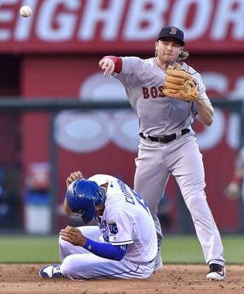 June 19, 2017 - Kansas City, MO, USA - Boston Red Sox third baseman Josh Rutledge forces out Boston Red Sox s Jackie Bradley Jr. at second but couldn t get the throw to first in time, allowing Alcides Escobar to reach safely in the second inning on Monday, June 19, 2017 at Kauffman Stadium in Kansas City, Mo. Boston Red Sox vs. Kansas City Royals - ZUMAm67_ 20170619_zaf_m67_024 Copyright: xJohnxSleezerx