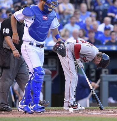 June 19, 2017 - Kansas City, MO, USA - Boston Red Sox s Josh Rutledge doubles over in front of Kansas City Royals catcher Drew Butera after being hit by a pitch from starting pitcher Jason Hammel in the second inning on Monday, June 19, 2017 at Kauffman Stadium in Kansas City, Mo. Boston Red Sox vs. Kansas City Royals - ZUMAm67_ 20170619_zaf_m67_026 Copyright: xJohnxSleezerx
