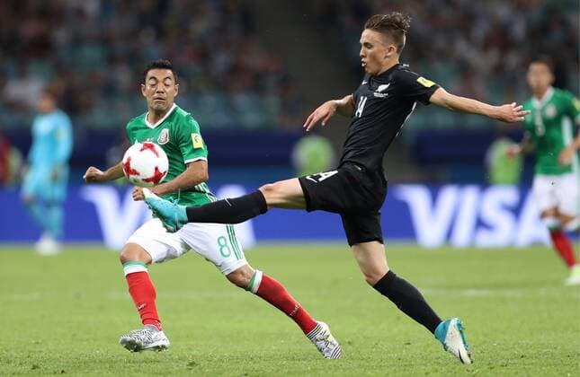 SOCHI, RUSSIA â€“ JUNE 21, 2017: Mexico s Marco Fabian (L) and New Zealand s Ryan Thomas fight for the ball in their 2017 FIFA Confederations Cup Group A match at Fisht Stadium. Artyom Korotayev TASS  TS054184