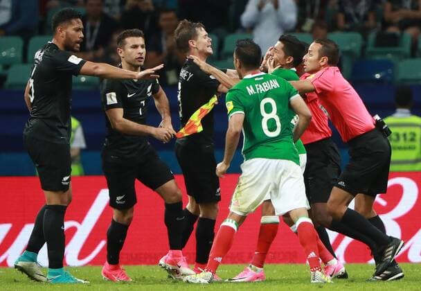 SOCHI, RUSSIA â€“ JUNE 21, 2017: New Zealand s and Mexico s players fight in their 2017 FIFA Confederations Cup Group A match at Fisht Stadium. Sergei Fadeichev TASS  TS054208