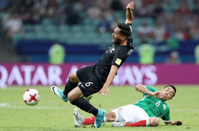 SOCHI, RUSSIA â€“ JUNE 21, 2017: New Zealand s Bill Tuiloma (L) and Mexico s Marco Fabian in action in their 2017 FIFA Confederations Cup Group A match at Fisht Stadium. Mexico won the game 2-1.Artyom Korotayev TASS  TS0541FA