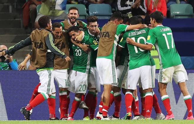 SOCHI, RUSSIA â€“ JUNE 21, 2017: Mexico s players celebrate scoring in their 2017 FIFA Confederations Cup Group A match against New Zealand at Fisht Stadium. Mexico won the game 2-1.Artyom Korotayev TASS  TS0541F5