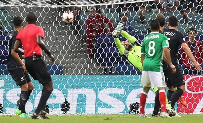 SOCHI, RUSSIA â€“ JUNE 21, 2017: New Zealand s goalkeeper Stefan Marinovic (C) concedes a goal in their 2017 FIFA Confederations Cup Group A match against Mexico at Fisht Stadium. Mexico won the game 2-1.Artyom Korotayev TASS  TS0541CD