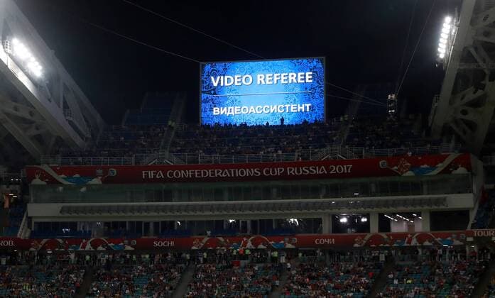 SOCHI, RUSSIA â€“ JUNE 21, 2017: A message on the screen reads Video Assistant Referee (VAR) during the 2017 FIFA Confederations Cup Group A match between Mexico and New Zealand at Fisht Stadium. Mexico won the game 2-1.Sergei Fadeichev TASS  TS054214