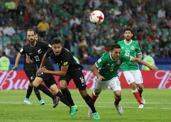 (170622) -- SOCHI, June 22, 2017 -- Marco Fabian (2nd R) of Mexico vies with Dane Ingham (2nd L) of New Zealand during the group A match between Mexico and New Zealand of the 2017 FIFA Confederations Cup in Sochi, Russia, on June 21, 2017. Mexico won 2-1. ) (SP)RUSSIA-MOSCOW-FIFA-CONFED CUP-MEX VS NZL XuxZijian 