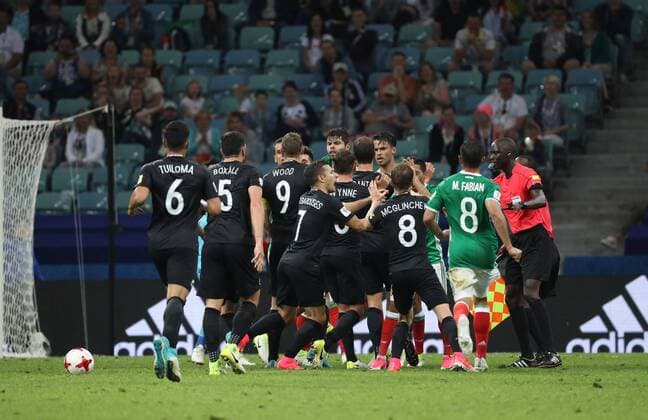 (170622) -- SOCHI, June 22, 2017 -- Referee Bakary Gassama(1st R) attempts to separate players as they fight during the group A match between Mexico and New Zealand of the 2017 FIFA Confederations Cup in Sochi, Russia, on June 21, 2017. Mexico won 2-1. ) (SP)RUSSIA-MOSCOW-FIFA-CONFED CUP-MEX VS NZL XuxZijian 