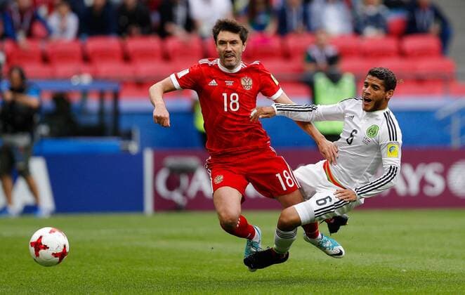 Mexico vs. Russia SAO PETERSBURGO, MO - 24.06.2017: MEXICO VS. RUSSIA - ZHIRKOV Yury of Russia fights ball with DOS SANTOS Jonathan of Mexico during match between Mexico and Russia valid for the third round of the Confederations Cup 2017 on Saturday (24) held Arena Kazan in Kazan, Russia. (Photo: Marcelo Machado de Melo Fotoarena) x1343459x  MarceloxMachadoxdexMelo