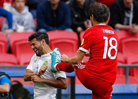 Mexico vs. Russia SAO PETERSBURGO, MO - 24.06.2017: MEXICO VS. RUSSIA - ZHIRKOV Yury of Russia misses in VELA Carlos of Mexico during Mexico-Russia match valid for the third round of the Confederations Cup 2017, this Saturday (24) held Arena Kazan in Kazan, Russia. (Photo: Marcelo Machado de Melo Fotoarena) x1343460x  MarceloxMachadoxdexMelo