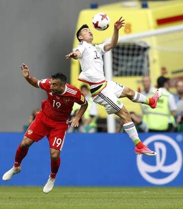 Mexico vs. Russia SAO PETERSBURGO, MO - 24.06.2017: MEXICO VS. RUSSIA - Alexander SAMEDOV of Russia contests ball with LOZANO Hirving of Mexico during a match between Mexico and Russia valid for the third round of the Confederations Cup 2017, on Saturday (24), held at Kazan Arena Stadium in Kazan, Russia. (Photo: Rodolfo Buhrer La Imagem Fotoarena) x1343478x  RodolfoxBuhrer
