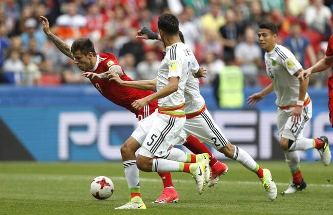 Mexico vs. Russia SAO PETERSBURGO, MO - 24.06.2017: MEXICO VS. RUSSIA - Fedor SMOLOV of Russia falls in the field during a match between Mexico and Russia valid for the third round of the Confederations Cup 2017 on Saturday (24) held at Kazan Arena Stadium in Kazan, Russia. (Photo: Rodolfo Buhrer La Imagem Fotoarena) x1343527x  RodolfoxBuhrer